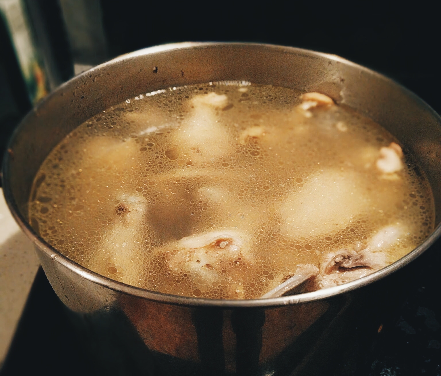 Your stock have a calm surface and at a point where a slight increase in heat will cause it to bubble.