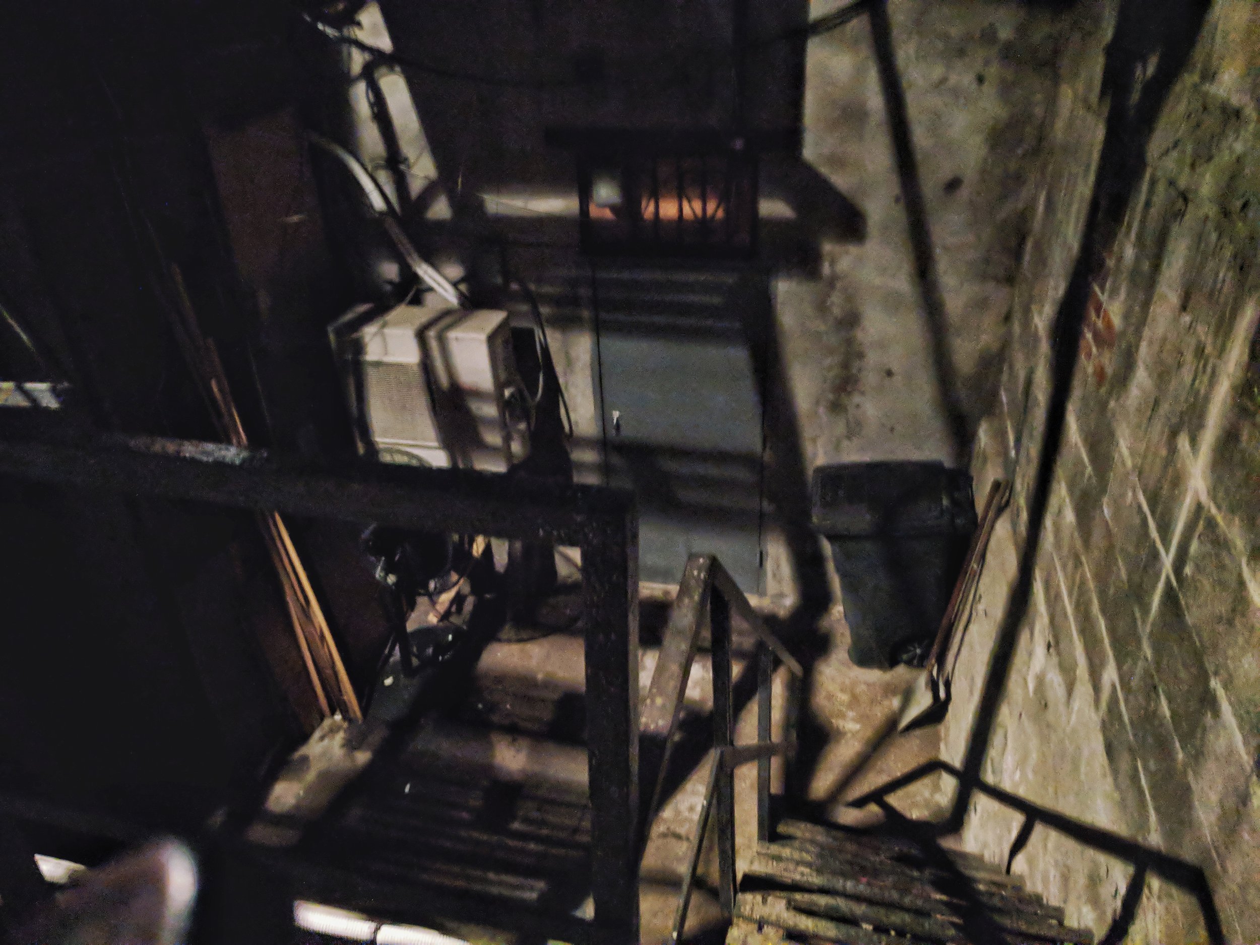 The stairs that lead you to an alleyway out of a horror movie